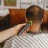 Barber is doing haircut Barber is doing haircut
